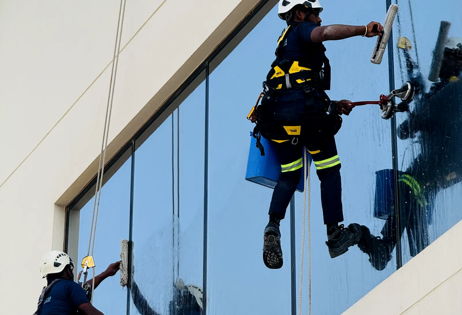 Certified rope access facade cleaning